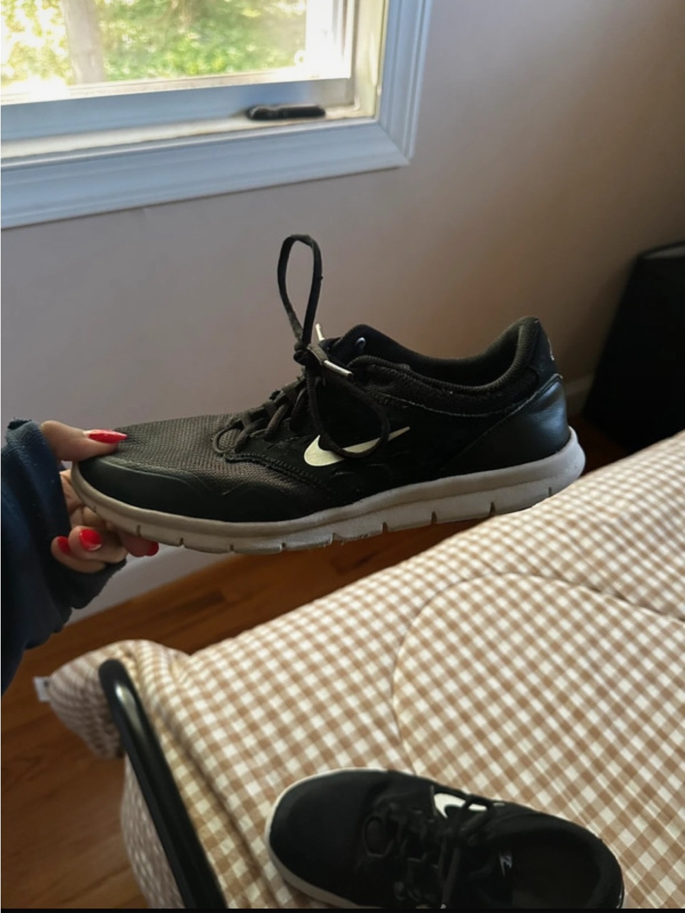 Nike Black Women's Sneaker with White Swoosh